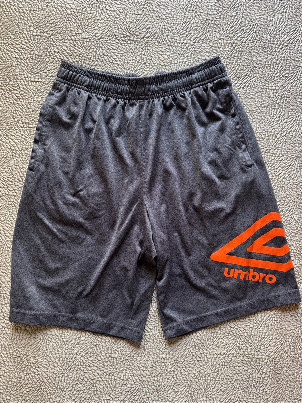 Umbro Youth Dark Gray Athletic Shorts with Orange Logo